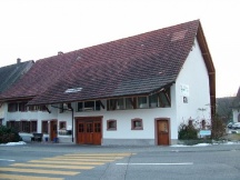 Altes Bauernhaus, best. Fassade mit Fasermaterial berspachtelt und Abrieb frisch erstellt.